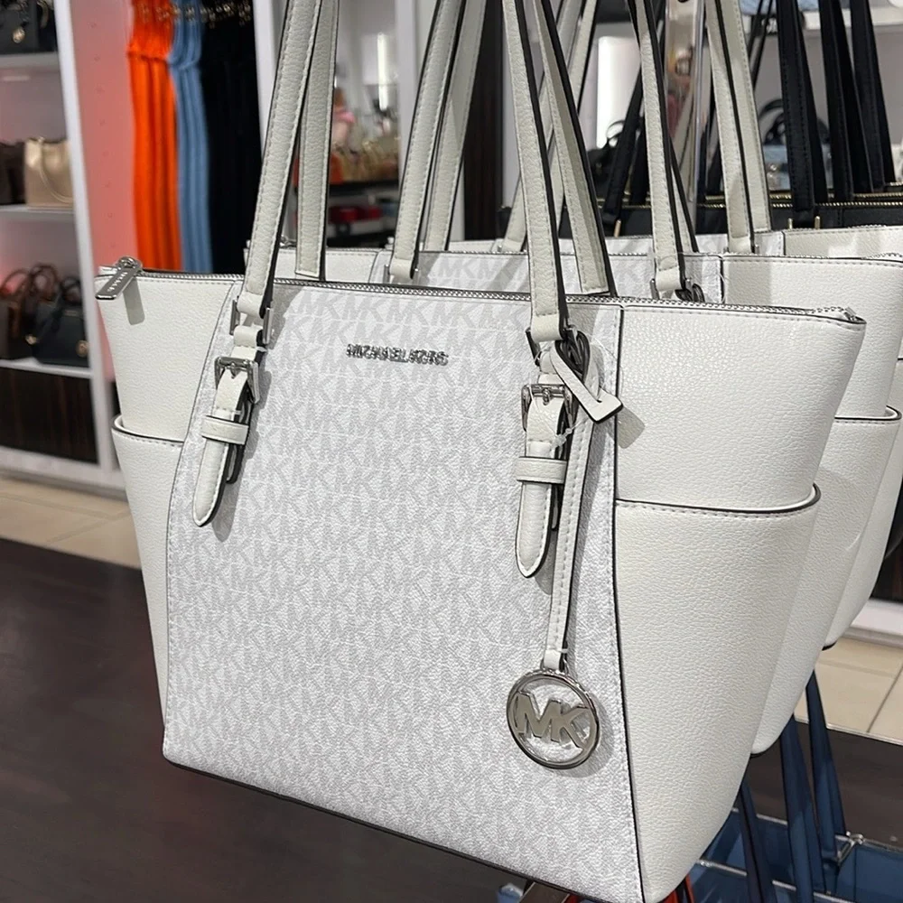 Michael Kors Charlotte Large Logo and Leather Top-Zip Tote Bag
Optic White
NWT - Picture 3 of 16